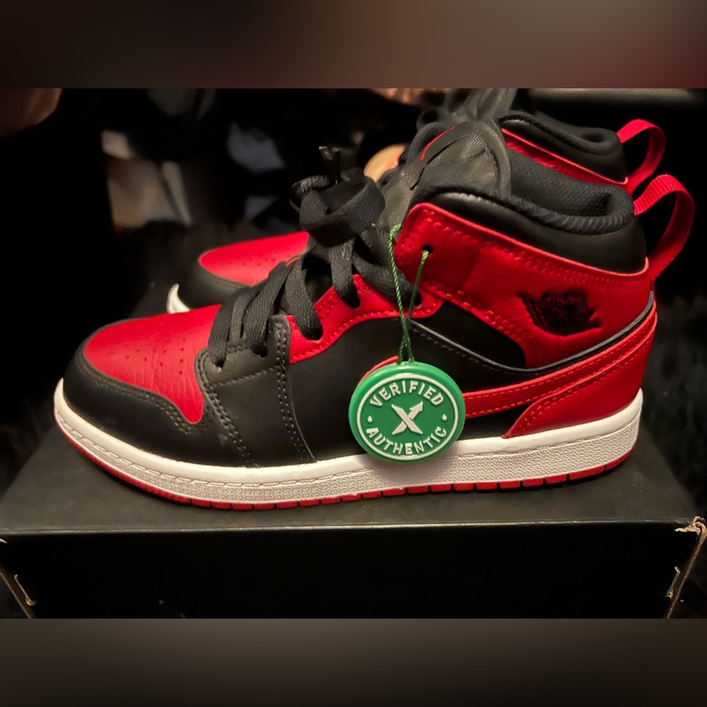 Little kid red white and black Nike 1’s